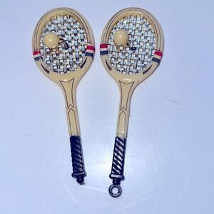 Vintage set of two hard plastic tennis rackets cake toppers with attached balls